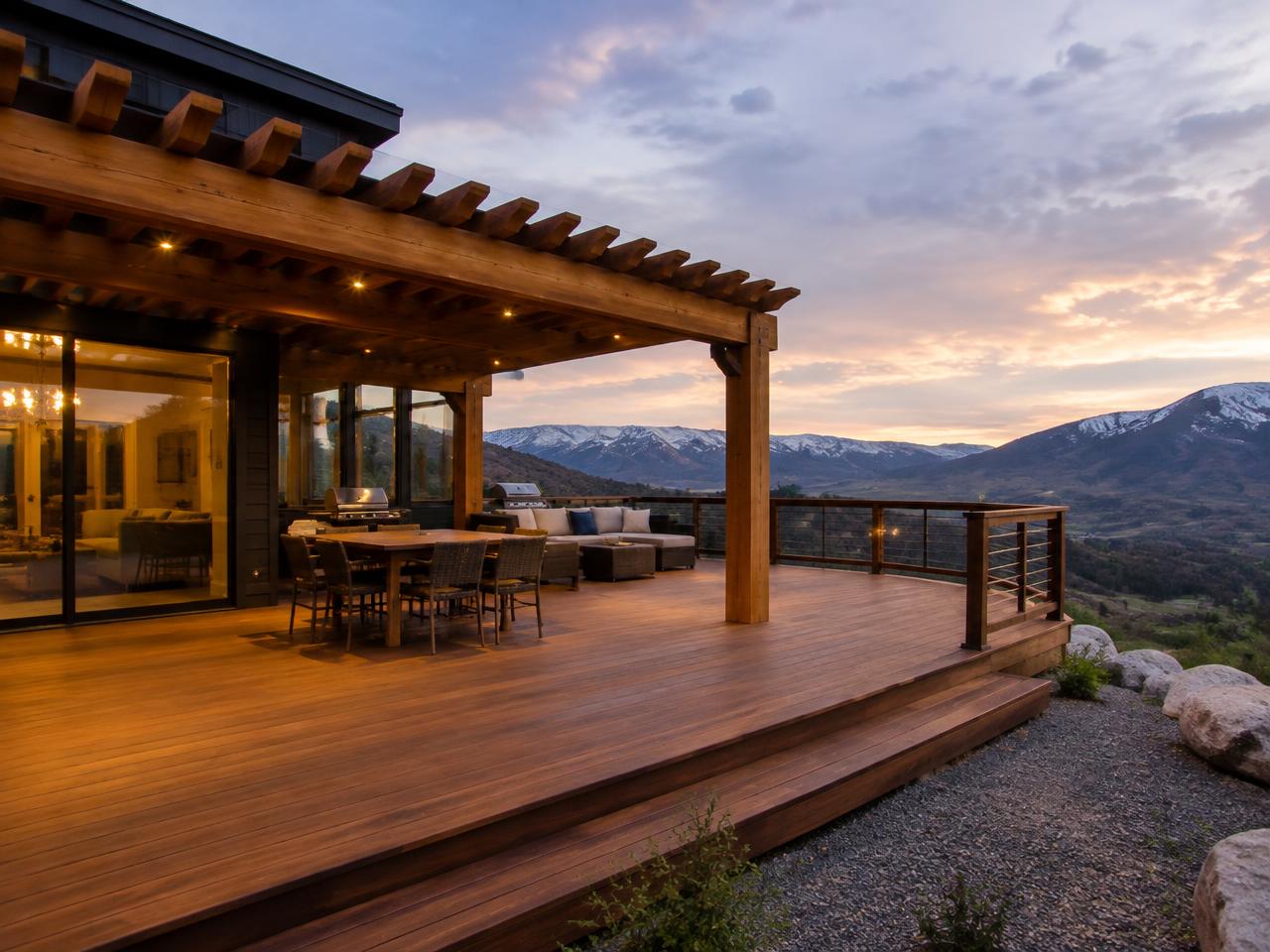 Illustrative timber deck and pergola facing the mountains